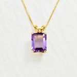 Yellow gold plated necklace with Amethyst February birthstone in radiant cut and prong setting. Purple solitaire necklace ideal for special occasions and birthday gift. Encourages calmness, spiritual growth, and emotional balance.
For peace, clarity, intuition