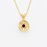 18k yellow gold necklace set with Red Garnet January birthstone, in round cut and prong setting, surrounded with small CZ diamonds. Dainty natural garnet pendant that boosts confidence, enhances courage, and inspires love and success. For passion, protection, & vitality.