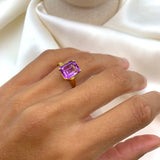 Yellow gold plated ring with natural amethyst February birthstone in emerald cut and prong setting. Bold solitaire ring ideal for anniversary present and birthday gift. For peace, clarity, intuition