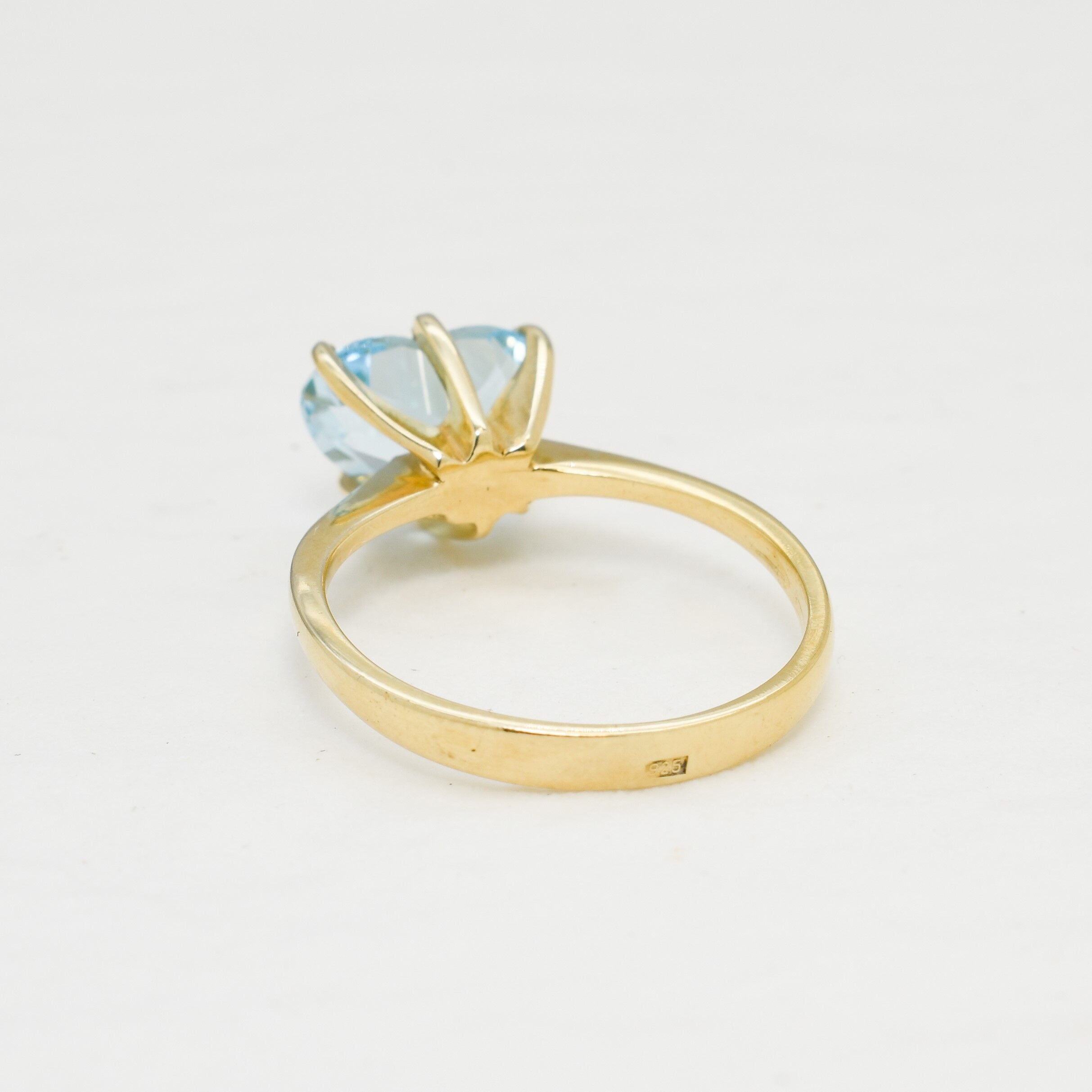 18k Yellow Gold Ring over solid sterling silver, set with heart-shaped aquamarine march birthstone, in a prong setting, and stunning blue color. Aquamarine Solitaire Ring as a valentine's gift ring, or anniversary ring