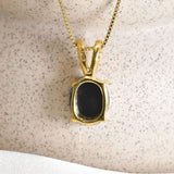 18k yellow gold necklace set with natural black hematite gemstone. Solitaire necklace for enhancing mental clarity and well being.