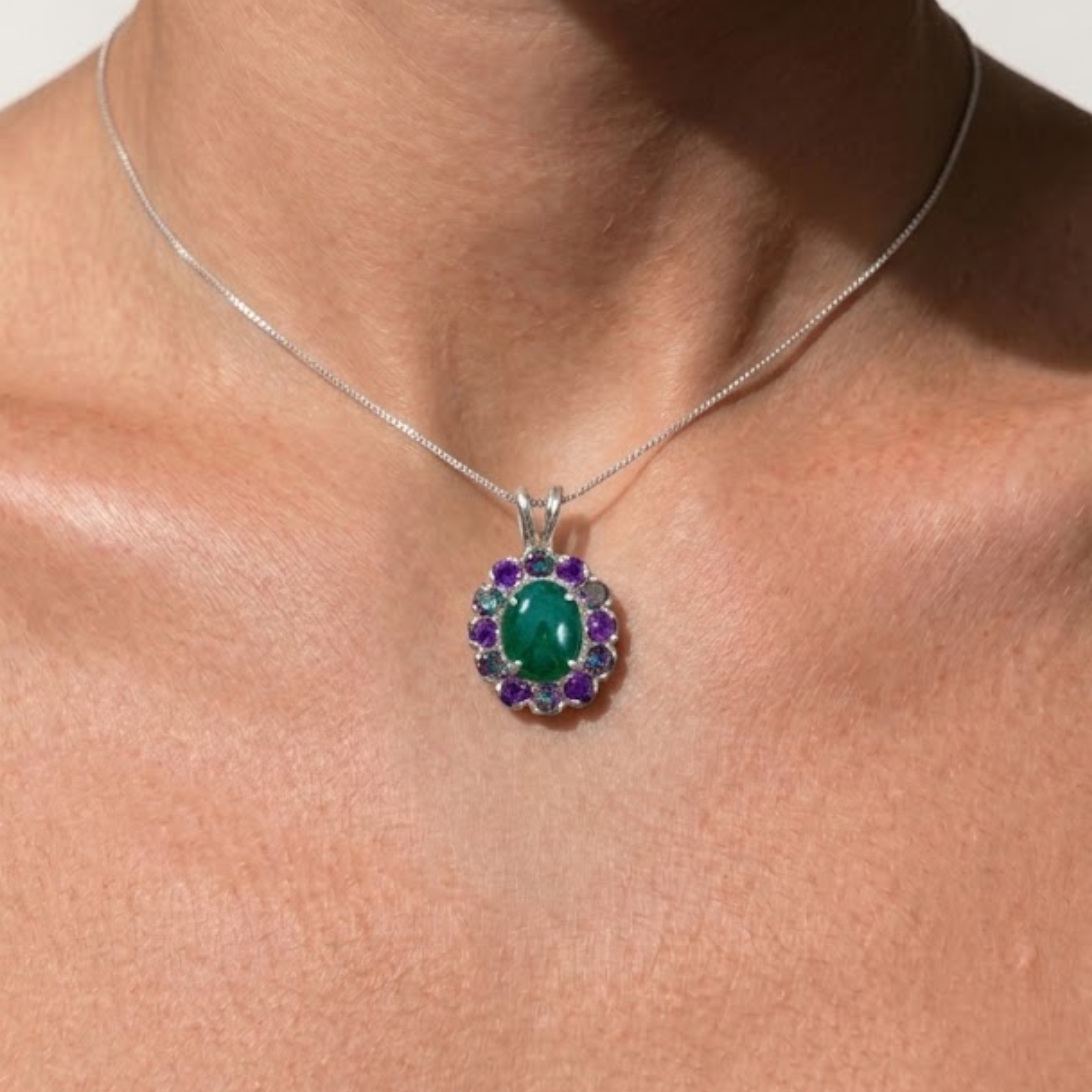 Sterling Silver Emerald Pendant featuring a vibrant Oval Created Green Emerald, perfect for birthdays and special occasions.