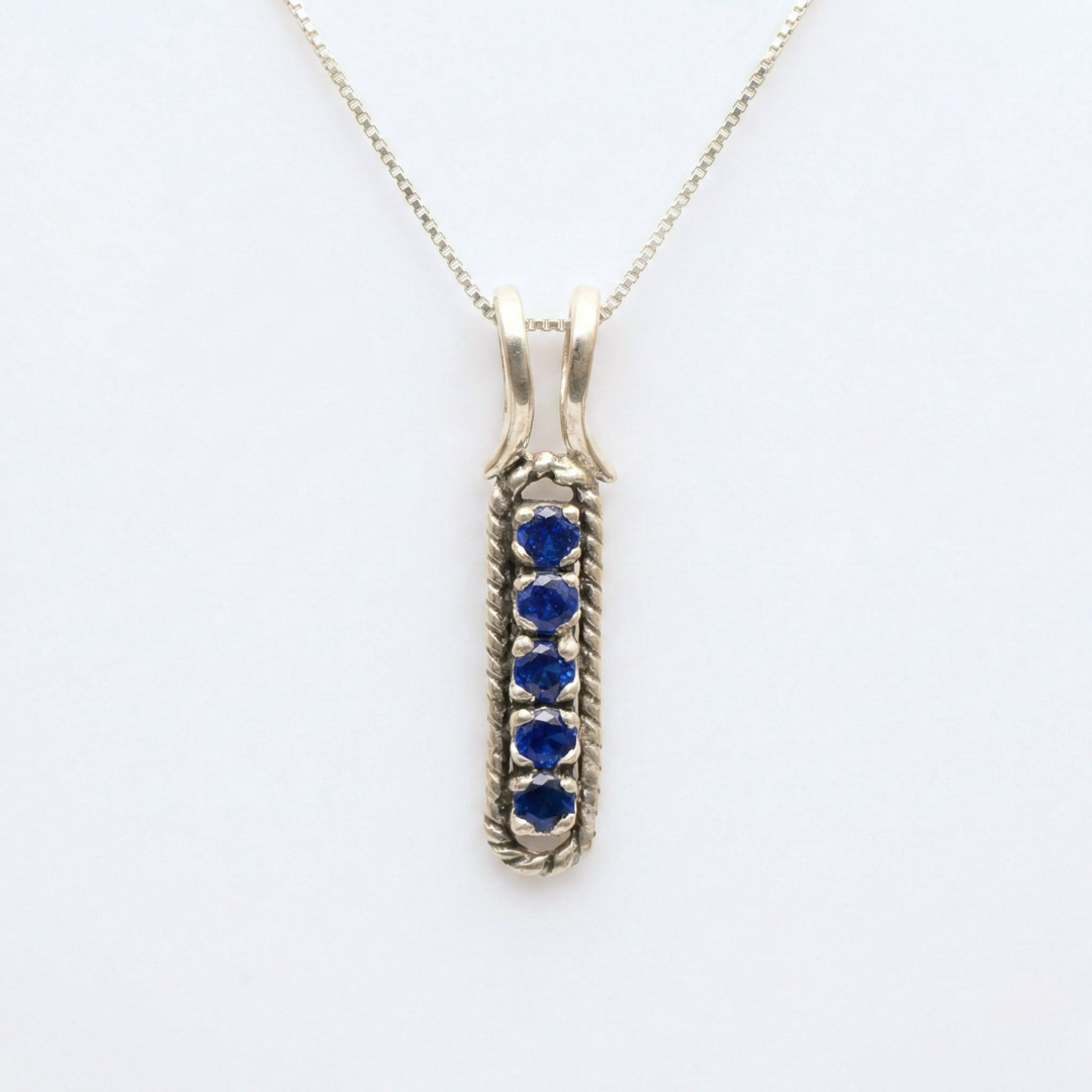 Created Sapphire Pendant made in 925 Sterling Silver with Round Created Blue Sapphire in Channel-Set setting, September Birthstone gift idea, symbolizes sincerity, truth, and faithfulness, ideal for everyday wear and perfect for birthday gifting and special occasions.