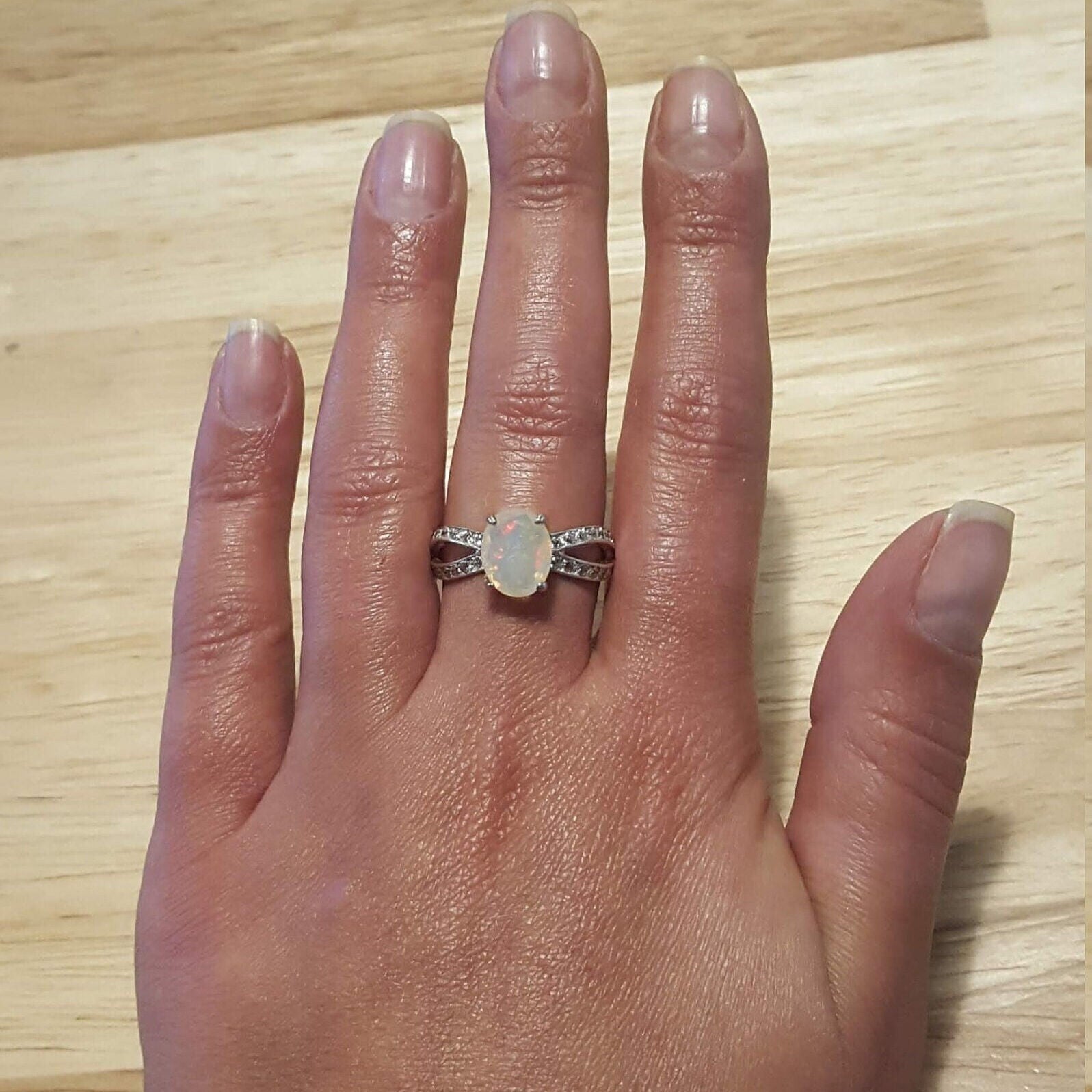 Sterling Silver Opal Ring featuring October's birthstone, perfect for daily wear and special birthday gifts.