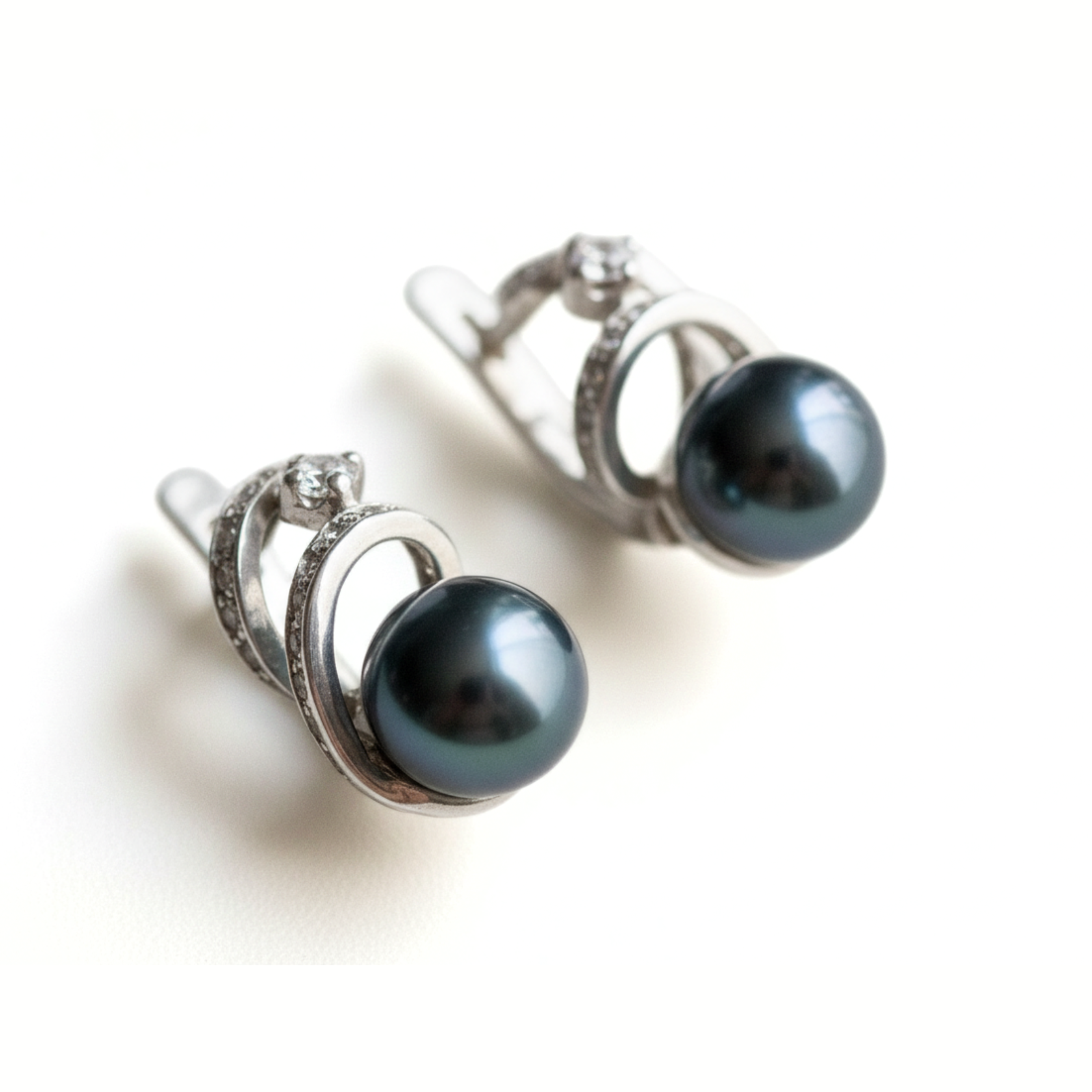 Chic Black Pearl Stud Earrings - Authentic Pearls set in 925 Sterling Silver, ideal for gifting and enhancing any outfit.