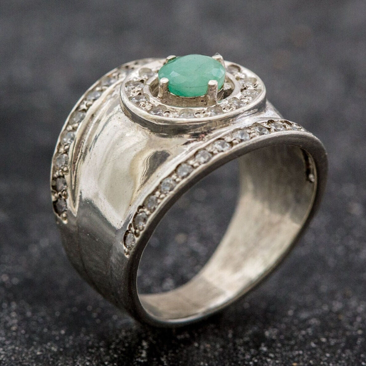 Charming 925 Sterling Silver ring showcasing a Round Natural Emerald, a lovely gift for May anniversaries and heartfelt occasions.