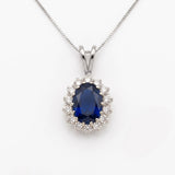 Created Sapphire Pendant made in 925 Sterling Silver with Oval Created Blue Sapphire in Halo setting, September Birthstone gift idea, symbolizes sincerity, truth, and faithfulness, ideal for everyday wear and perfect for birthday gifting and special occasions.