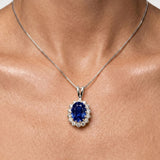925 Sterling Silver Sapphire Pendant featuring a stunning oval blue sapphire in a halo setting, perfect for special occasions.