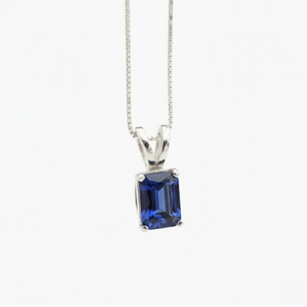 Elegant 925 Sterling Silver pendant adorned with baguette blue sapphire, a timeless piece for any jewelry collection.