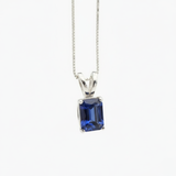 Elegant 925 Sterling Silver pendant adorned with baguette blue sapphire, a timeless piece for any jewelry collection.