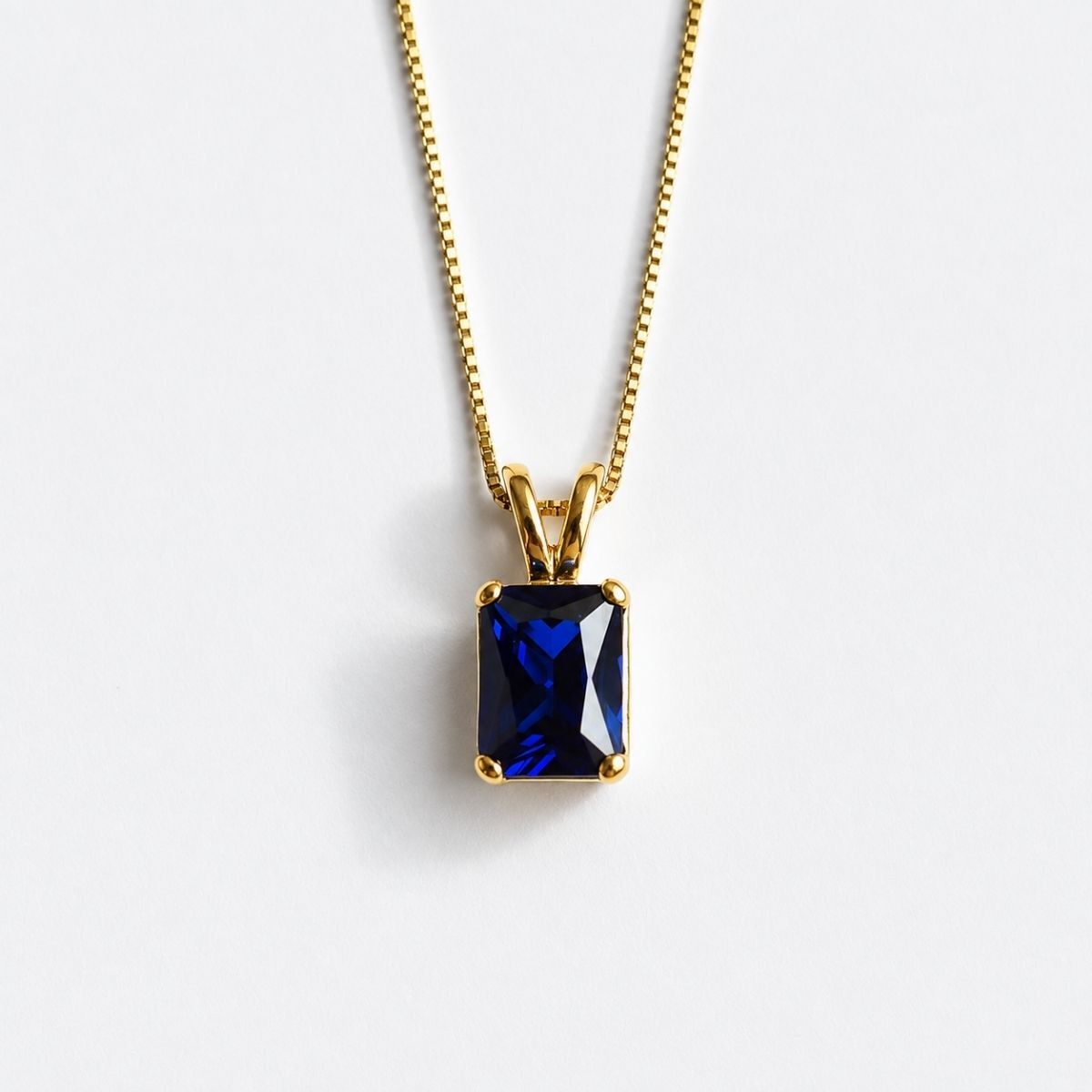 Created Sapphire Pendant made in 18k Gold Vermeil with Baguette Created Blue Sapphire in Solitaire setting, September Birthstone gift idea, symbolizes sincerity, truth, and faithfulness, ideal for everyday wear and perfect for birthday gifting and special occasions.