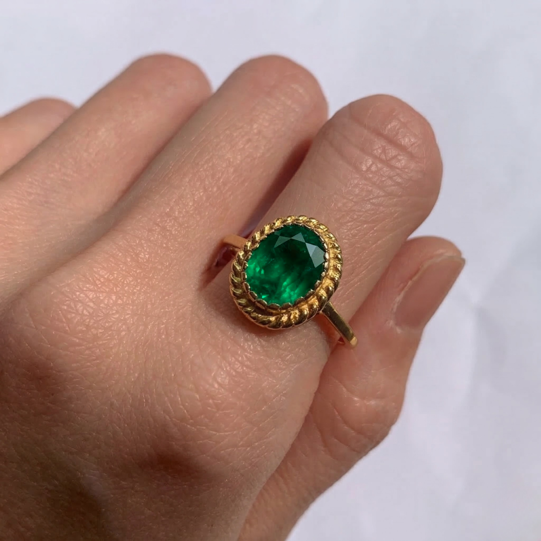 18k Gold Vermeil Ring with a stunning Oval Green Emerald, a chic accessory for everyday elegance and meaningful gifting.
