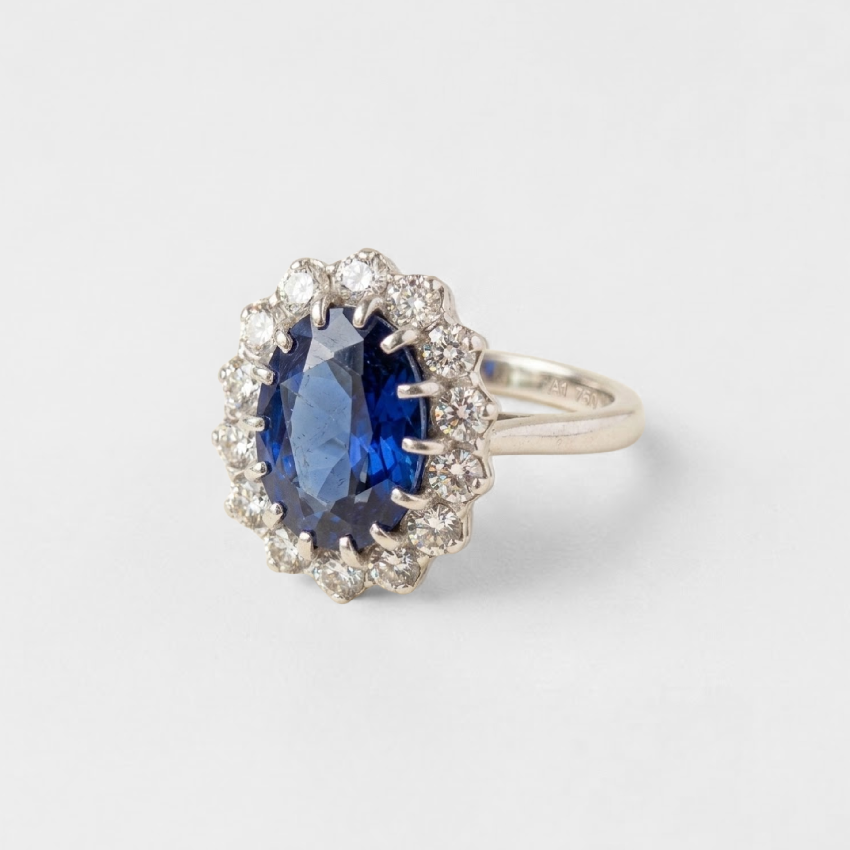 Created Sapphire Ring made in 925 Sterling Silver with Oval Created Blue Sapphire in Halo setting, September Birthstone gift idea, symbolizes sincerity, truth, and faithfulness, ideal for everyday wear and perfect for birthday gifting and special occasions.