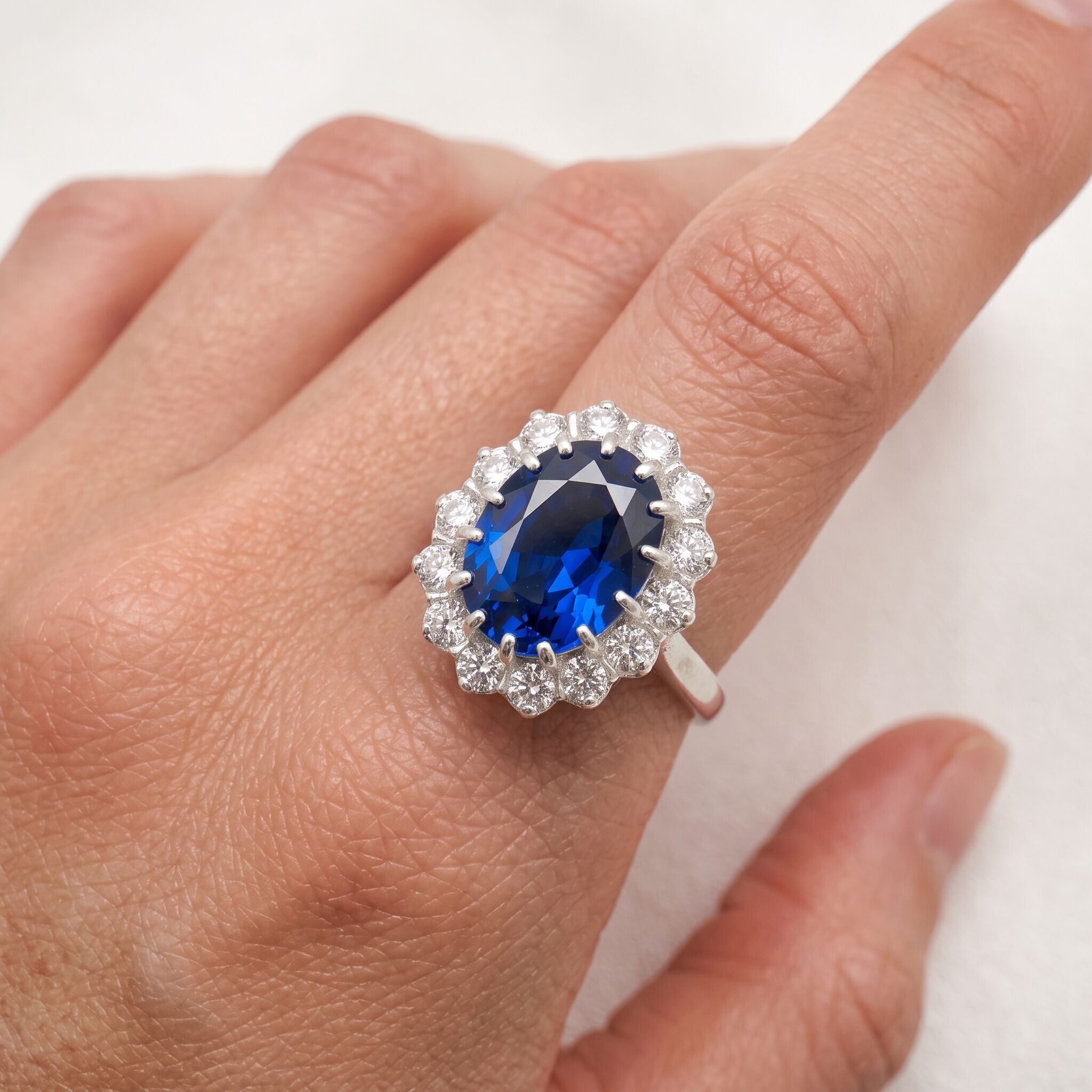 Elegant 925 Sterling Silver ring featuring a stunning Oval Created Blue Sapphire, perfect for birthdays and special occasions.