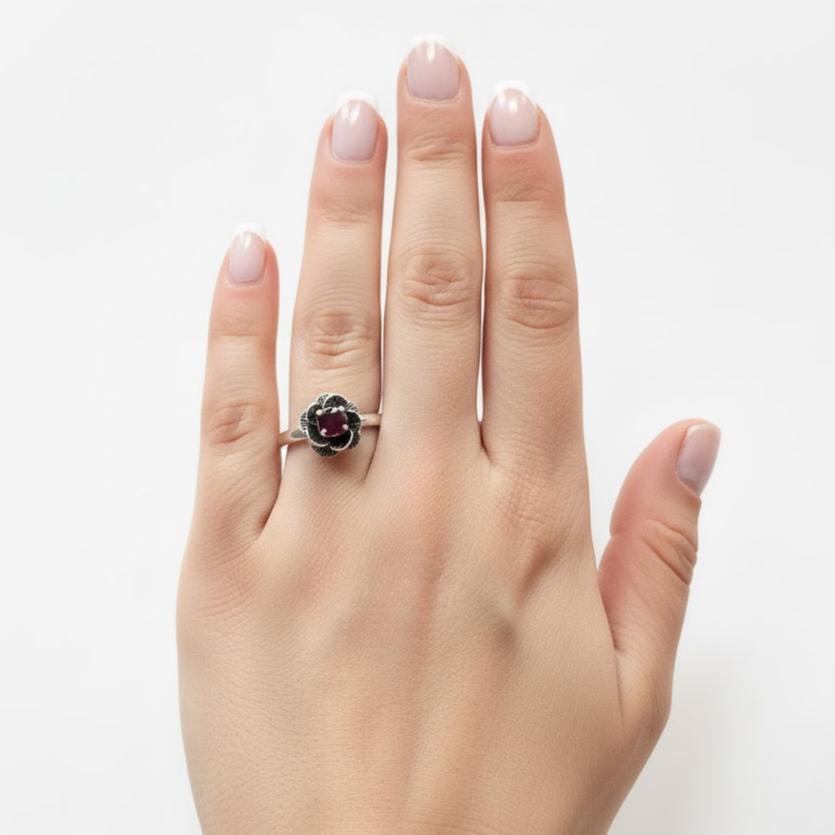 Charming 925 Sterling Silver ring with a prong-set round natural ruby, a timeless piece for any jewelry collection.