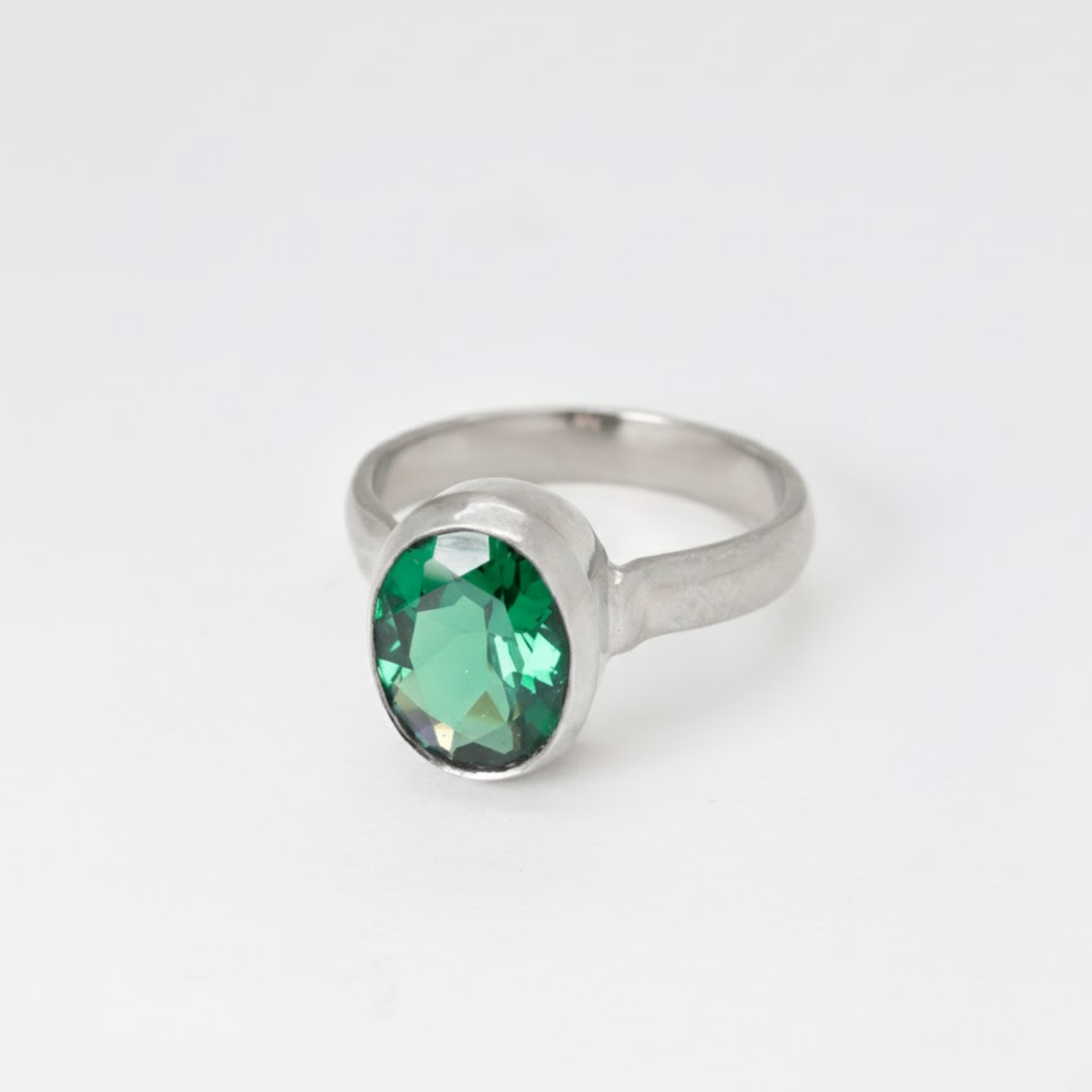 Beautiful 925 Sterling Silver ring set with Created Oval Green Emerald, a meaningful May birthstone gift for any occasion.
