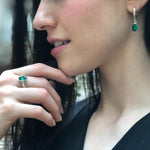 925 Sterling Silver ring showcasing an Oval Created Green Emerald, a chic May birthstone accessory for special occasions.