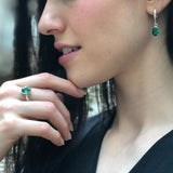 925 Sterling Silver ring showcasing an Oval Created Green Emerald, a chic May birthstone accessory for special occasions.