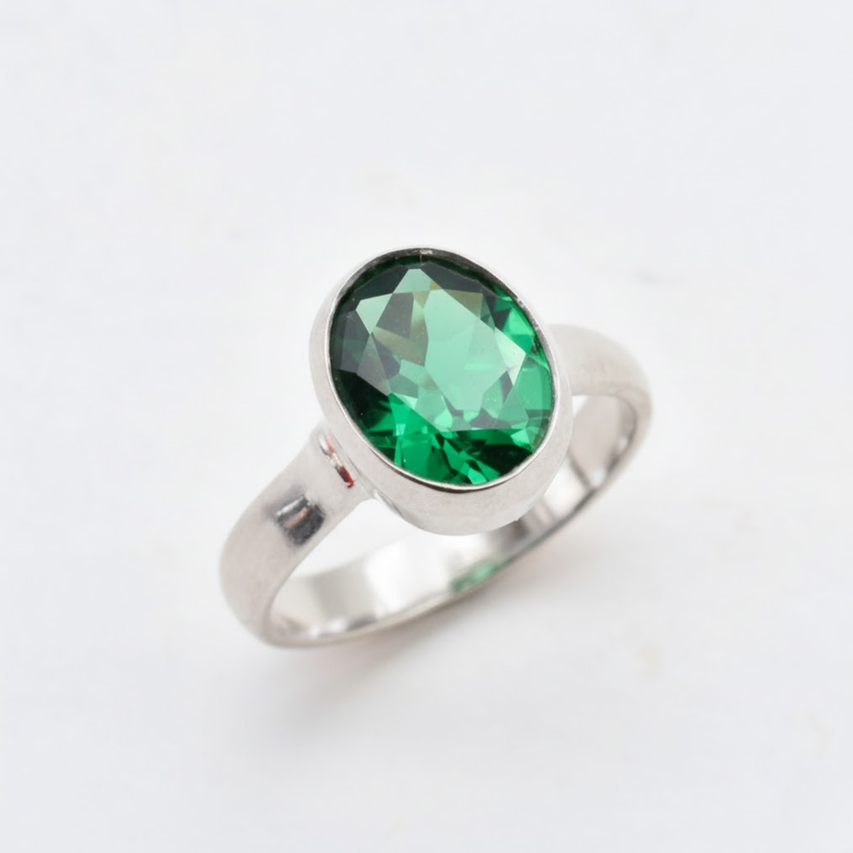 Elegant 925 Sterling Silver Emerald Ring with Oval Created Green Emerald, a stylish choice for May birthdays and daily wear.
