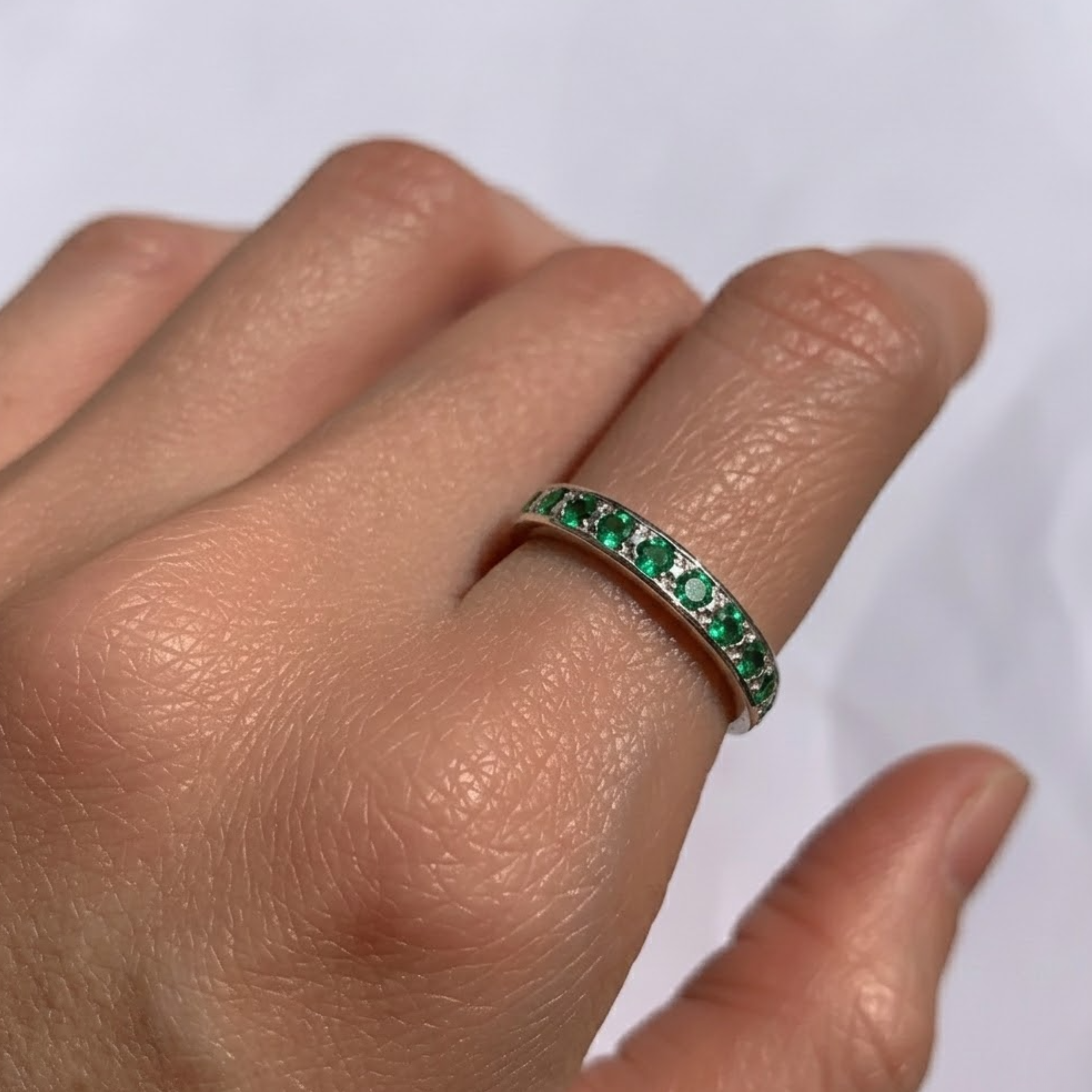 Elegant 925 Sterling Silver ring featuring a Round Created Green Emerald, perfect for May birthdays and special occasions.