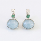 Charming 925 Sterling Silver Aquamarine Earrings featuring oval blue stones, a lovely gift for birthdays and special moments.