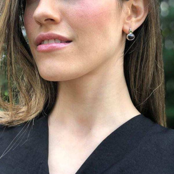 A beautifully arranged set of colorful gemstones, showcasing intricate designs and sparkling brilliance.