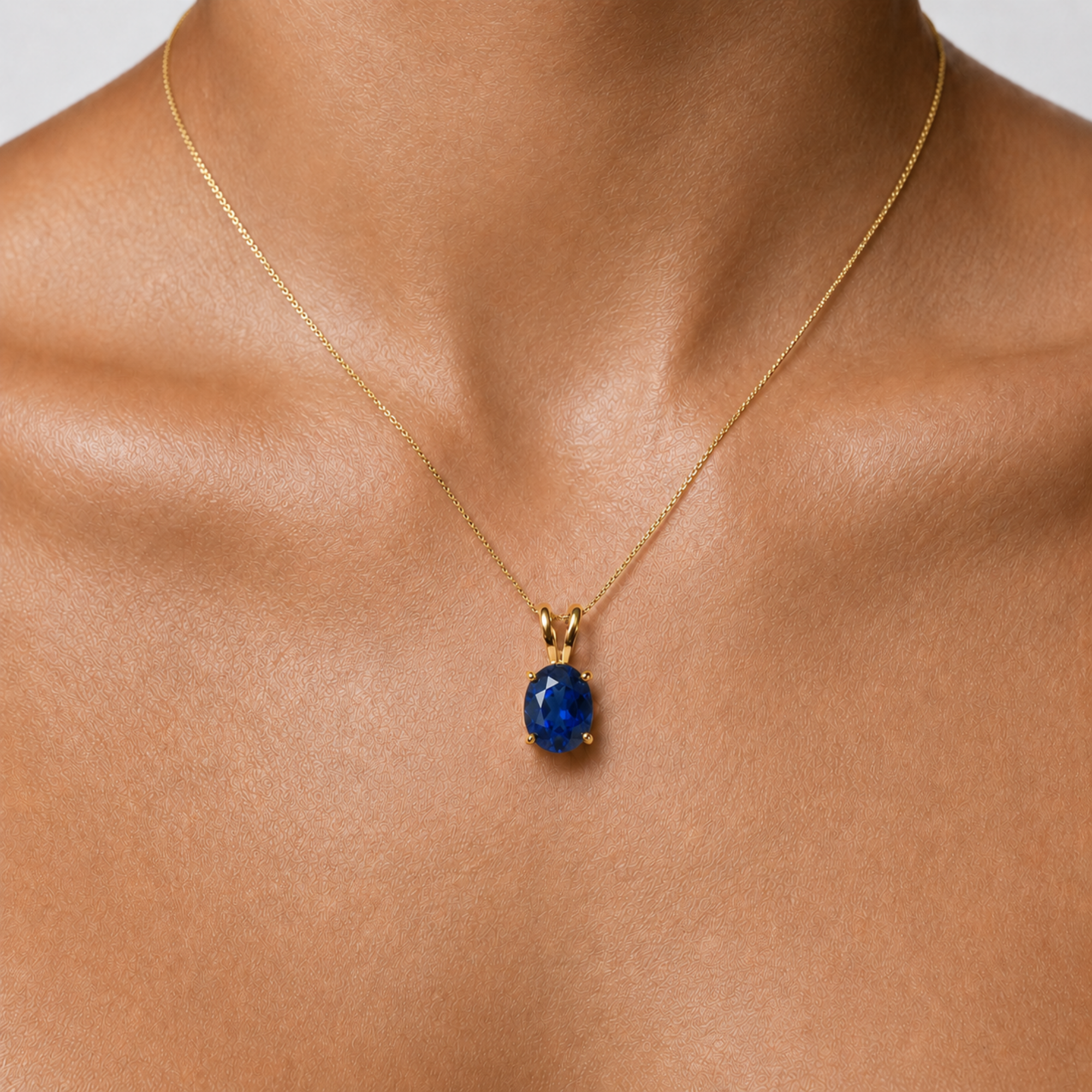 18k Gold Vermeil Sapphire Pendant featuring a stunning oval blue sapphire, perfect for September birthdays and special occasions.
