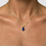 18k Gold Vermeil Sapphire Pendant featuring a stunning oval blue sapphire, perfect for September birthdays and special occasions.