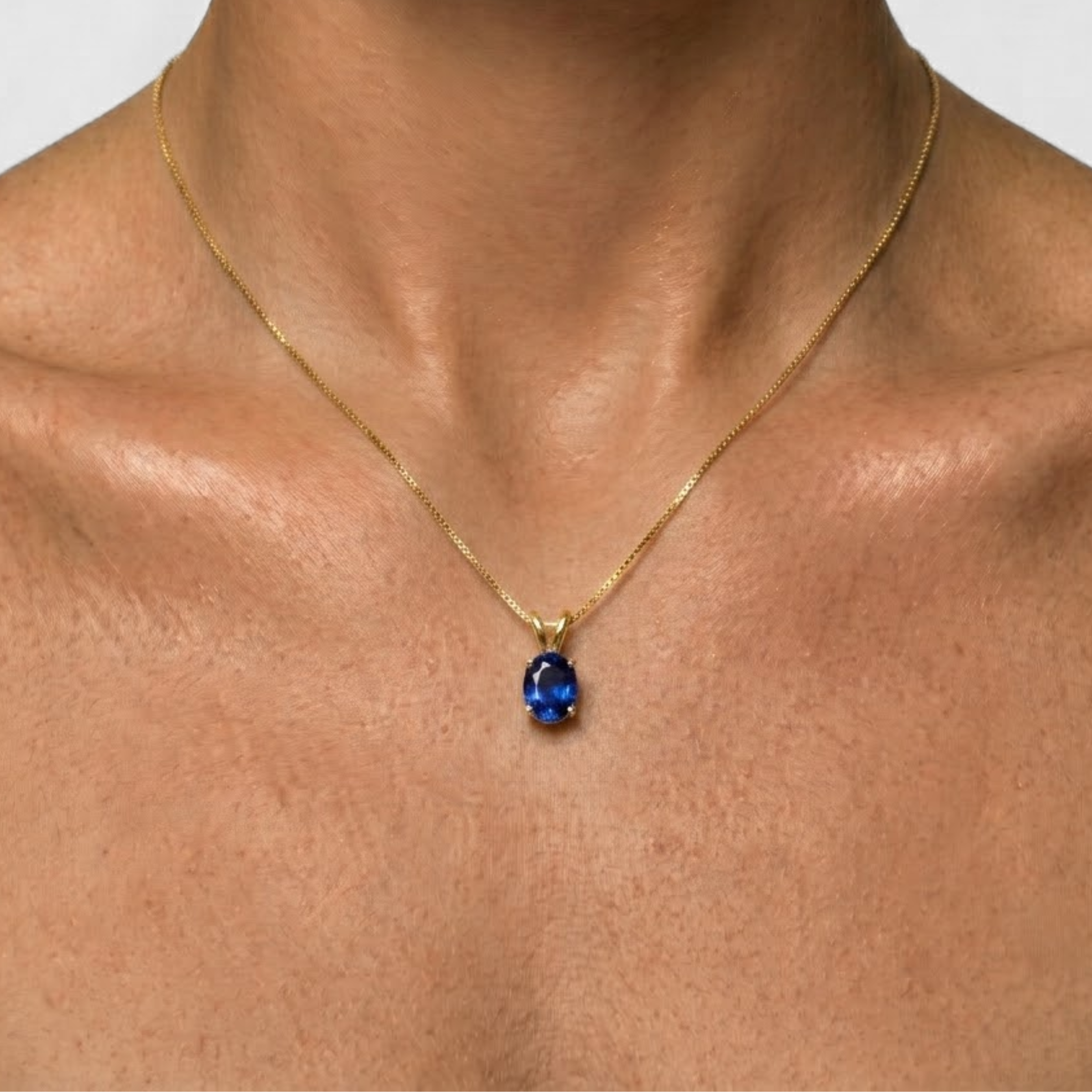 18k Gold Vermeil Sapphire Pendant featuring a stunning oval blue sapphire, perfect for September birthdays and special occasions.