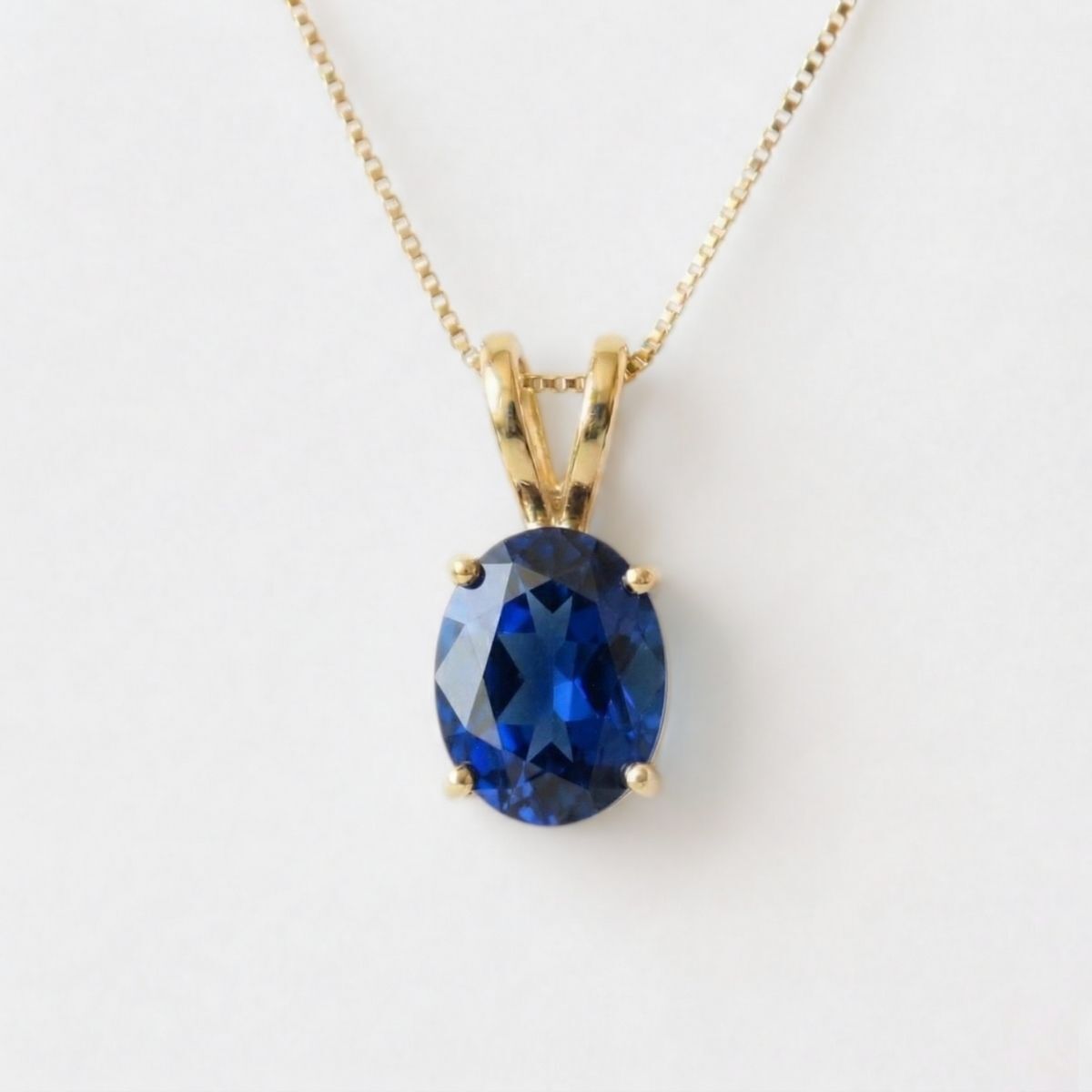 Created Sapphire Pendant made in 18k Gold Vermeil with Oval Created Blue Sapphire in Prong setting, September Birthstone gift idea, symbolizes sincerity, truth, and faithfulness, ideal for everyday wear and perfect for birthday gifting and special occasions.