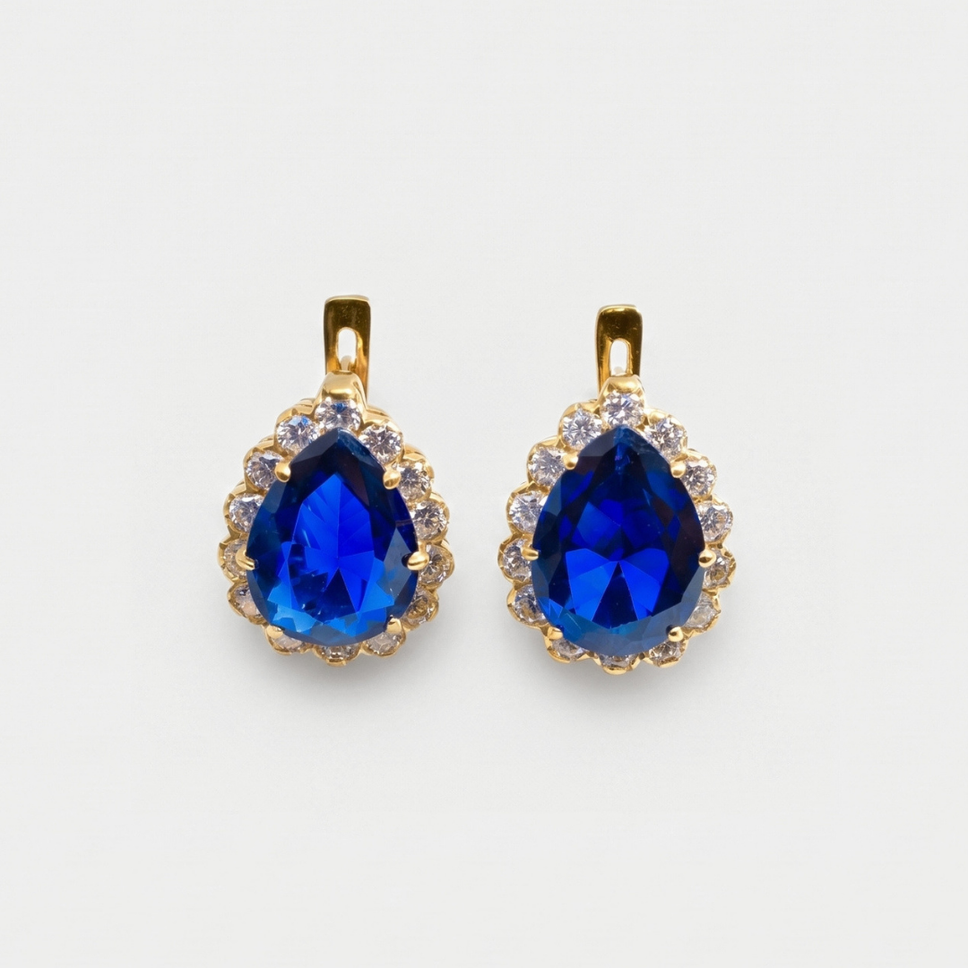 Created Sapphire Earrings made in 18k Gold Vermeil with Pear Created Blue Sapphire in Prong setting, September Birthstone gift idea, symbolizes sincerity, truth, and faithfulness, ideal for everyday wear and perfect for birthday gifting and special occasions.