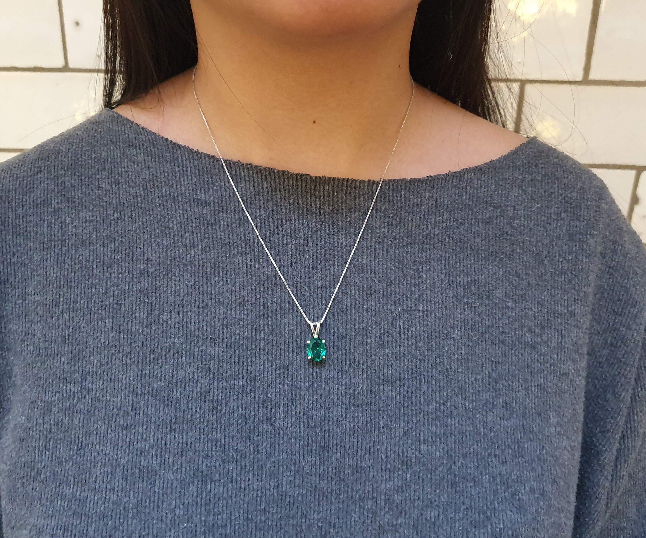 Elegant 925 Sterling Silver Emerald Pendant with Oval Created Green Emerald, perfect for May birthdays and special occasions.