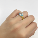 Elegant 18k Gold Vermeil Aquamarine Ring with Oval Center Stone, perfect for March birthdays and showcasing courage and luck.