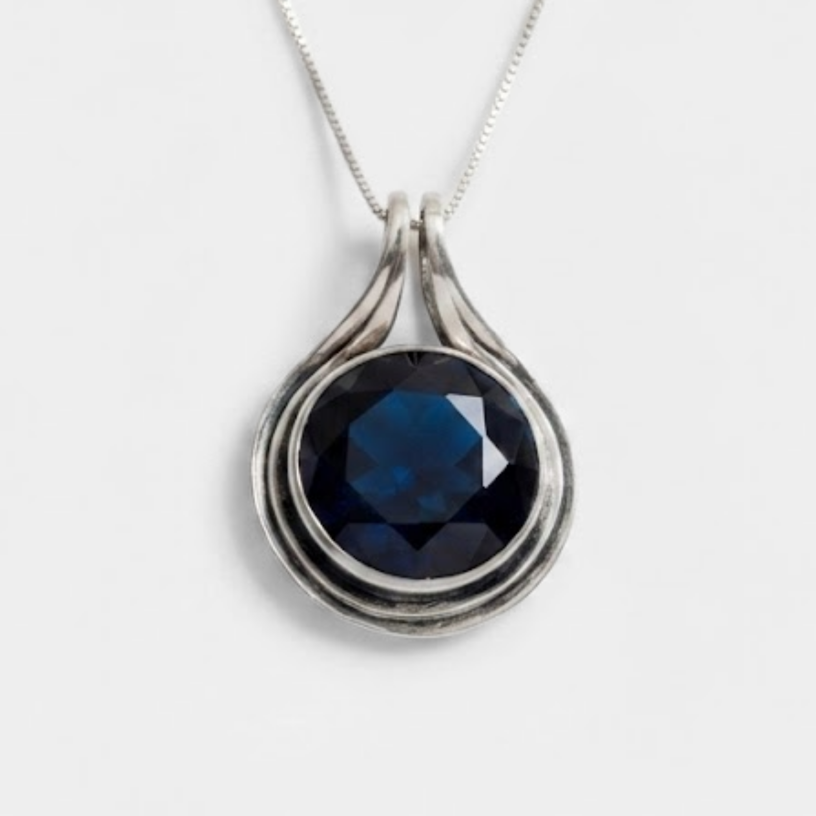 Created Sapphire Pendant made in 925 Sterling Silver with Round Created Blue Sapphire in Bezel setting, September Birthstone gift idea, symbolizes sincerity, truth, and faithfulness, ideal for everyday wear and perfect for birthday gifting and special occasions.