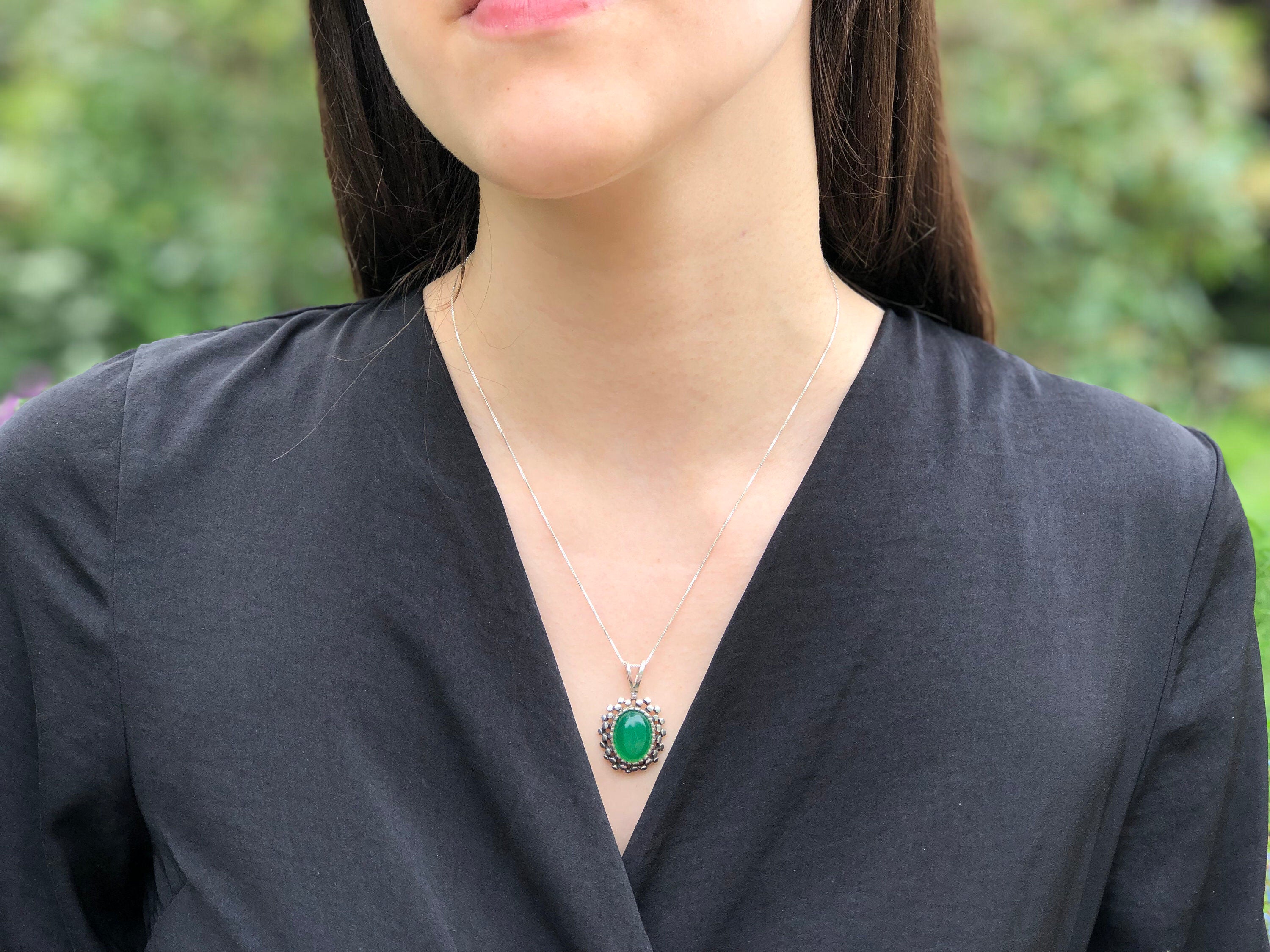 Elegant 925 Sterling Silver Emerald Pendant with Oval Created Green Emerald, perfect for May birthdays and special occasions.