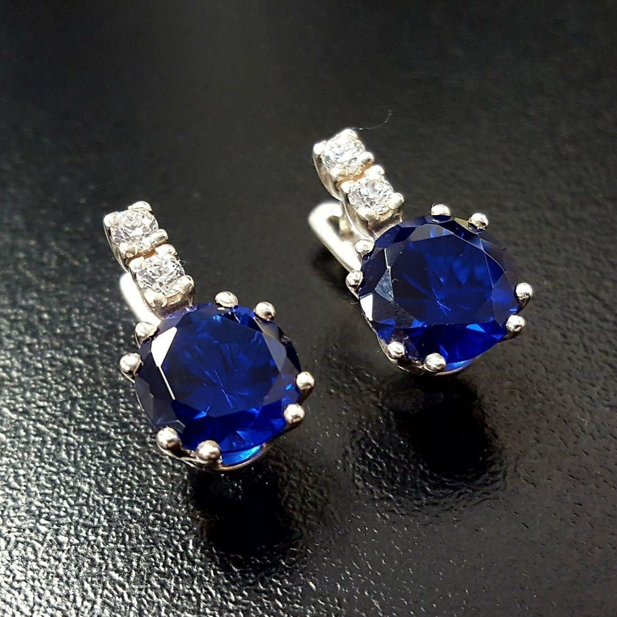 Stylish Created Sapphire Earrings in 925 Sterling Silver, perfect for adding a pop of color to any outfit or occasion.