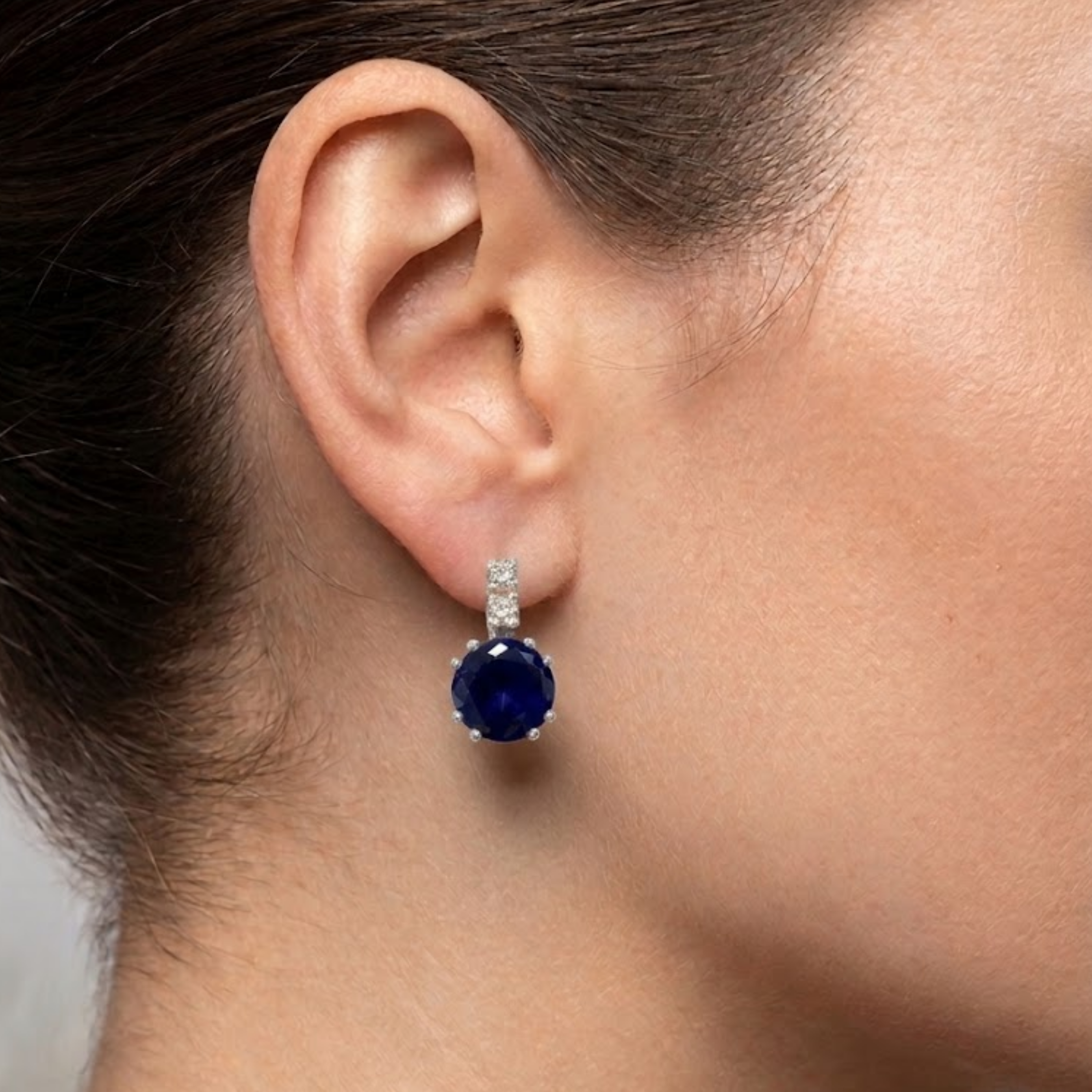 Created Sapphire Earrings in 925 Sterling Silver, showcasing round blue sapphires—perfect for birthdays and special occasions.