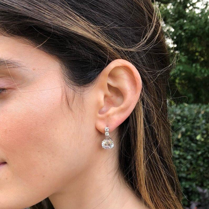 Created Sapphire Earrings in 925 Sterling Silver, showcasing round blue sapphires—perfect for birthdays and special occasions.