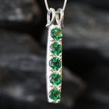 Dazzling 925 Sterling Silver pendant featuring a round Created Green Emerald, perfect for everyday elegance and special events.
