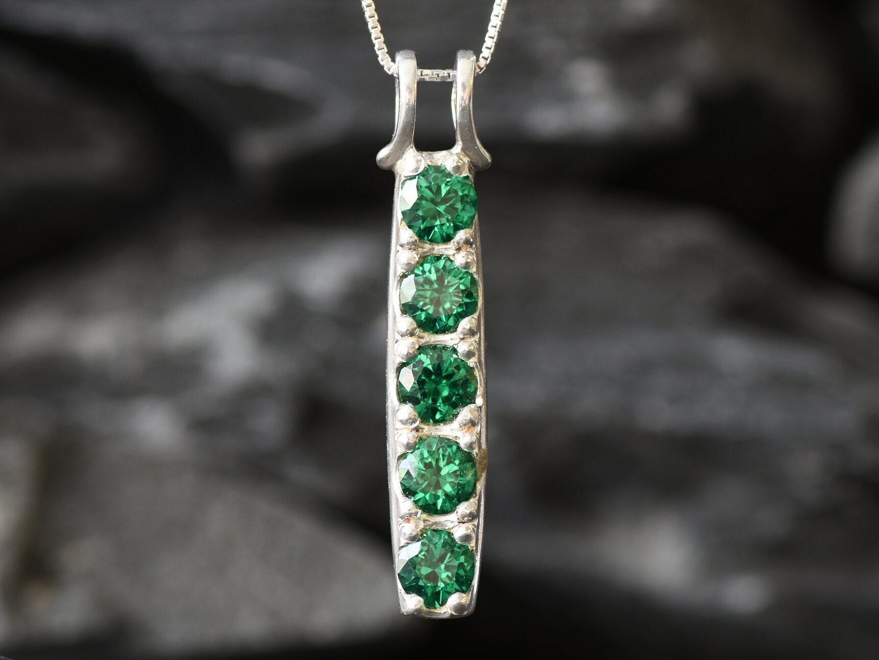 Elegant 925 Sterling Silver earrings featuring round Created Green Emeralds, perfect for everyday wear and special occasions.