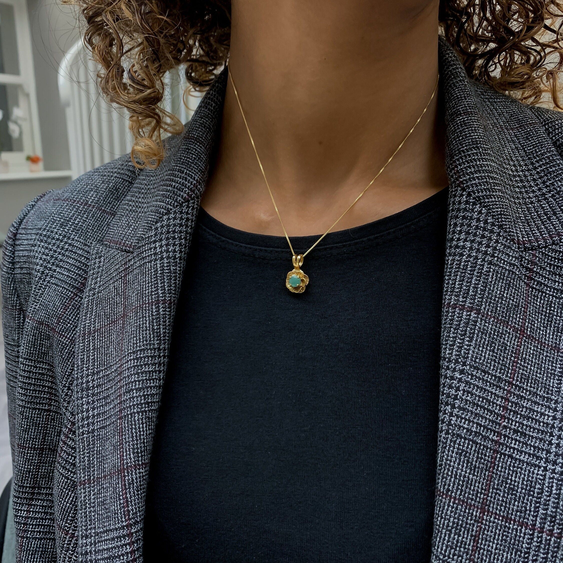 Radiant 18k Gold Vermeil Pendant featuring a vibrant round emerald, a meaningful May birthstone for nurturing and connection.