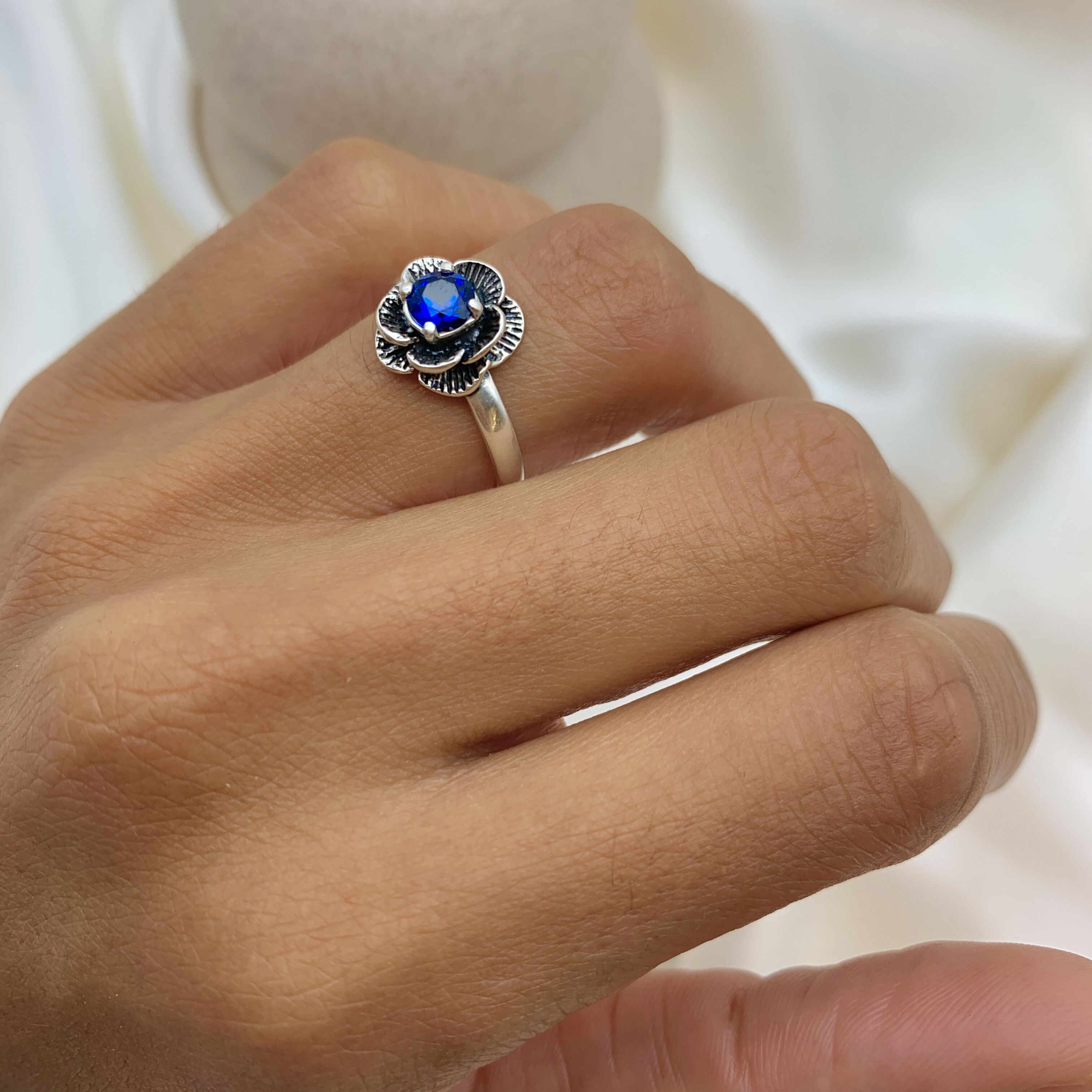 Created Sapphire Ring in Sterling Silver, featuring a vibrant blue stone, ideal for birthdays and special occasions.