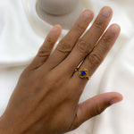 Elegant Created Sapphire Ring in 18k Gold Vermeil, featuring a round sapphire, symbolizes truth and perfect for special occasions.