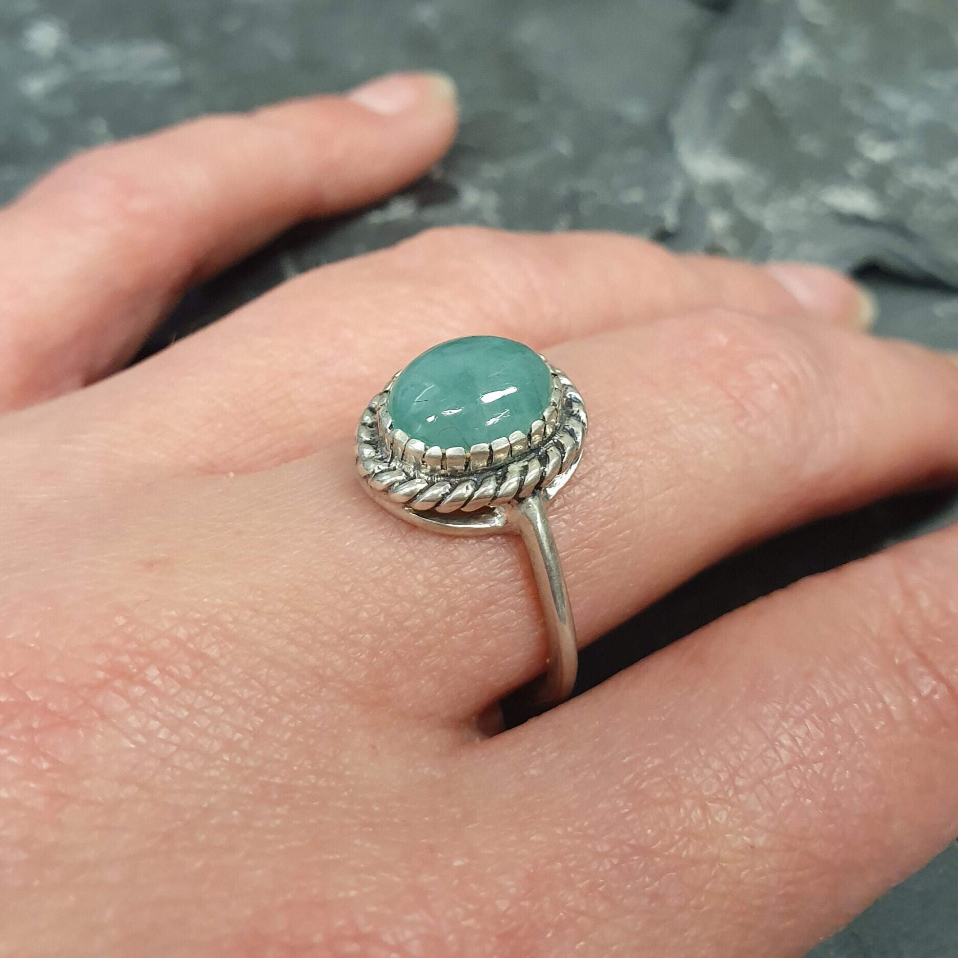 Elegant 925 Sterling Silver ring featuring a stunning Oval Natural Green Emerald, perfect for May birthdays and special occasions.