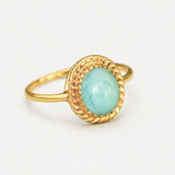 Stunning 18k gold vermeil ring with a brilliant oval green emerald, a symbol of healing and harmony, ideal for daily wear.