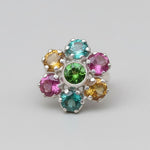 A serene sunset over a tranquil lake, with vibrant reflections shimmering on the water's surface.