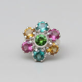 A serene sunset over a tranquil lake, with vibrant reflections shimmering on the water's surface.