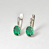 Created Emerald Earrings made in 925 Sterling Silver with Oval Created Green Emerald in Prong setting, May Birthstone gift idea, symbolizes, ideal for everyday wear and perfect for birthday gifting and special occasions.