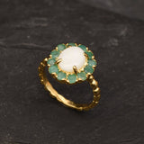 Stunning 18k Gold Vermeil Opal Ring featuring a radiant White Opal, ideal for October birthdays and meaningful gift-giving.