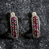 Natural Ruby Earrings made in 925 Sterling Silver with Round Natural Red Ruby in Channel-Set setting, July Birthstone gift idea, symbolizes nobility, purity, and passion, ideal for everyday wear and perfect for birthday gifting and special occasions.